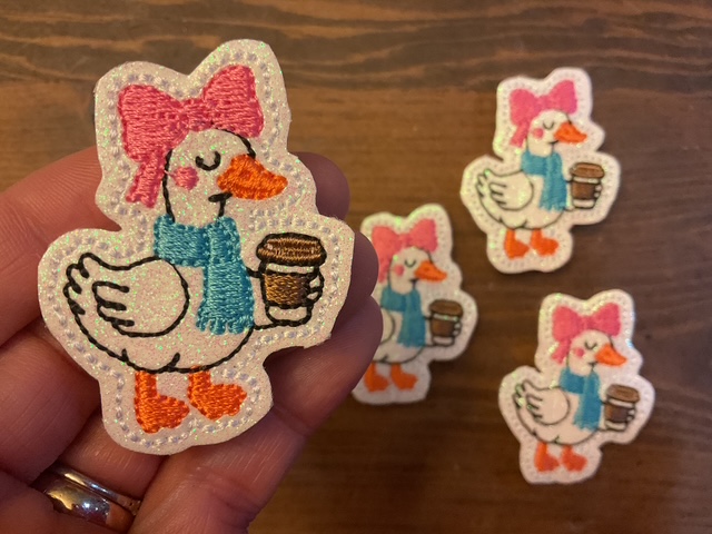 Goose with Pink Bow and Coffee Cup Bopper Topper